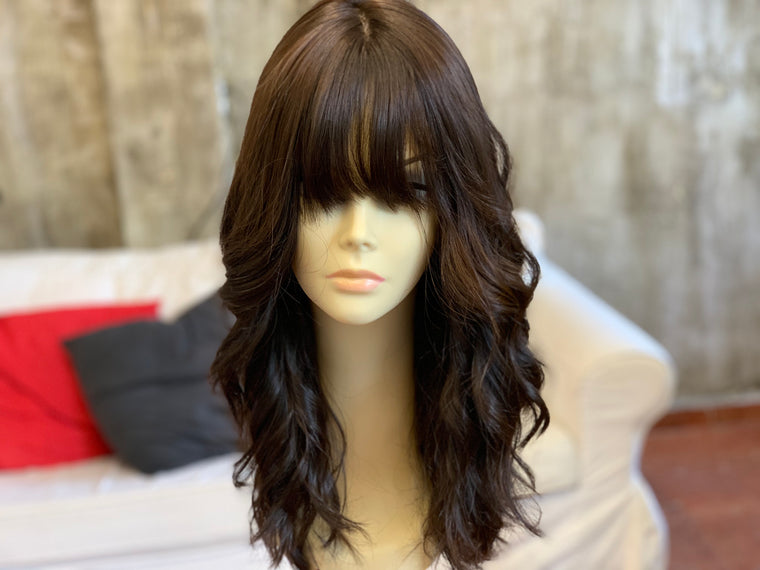 100% Virgin European human hair wig 20" long Dark brown with soft caramel highlights.